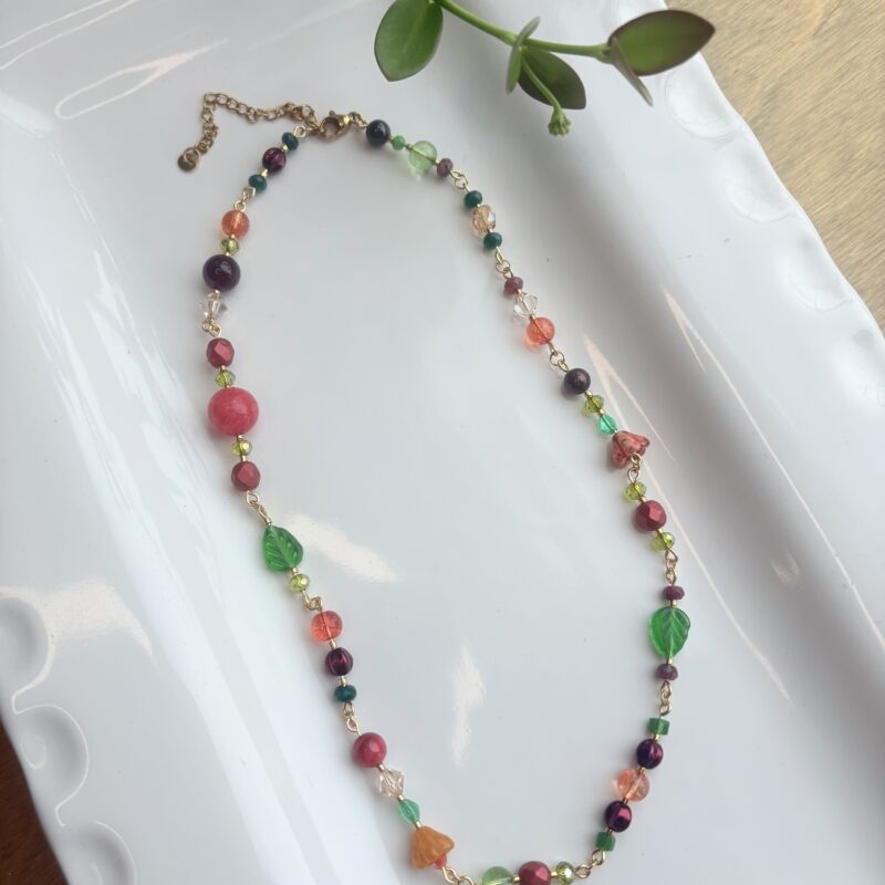 Anka Snider pink, green leaf, purple, orange beaded necklace