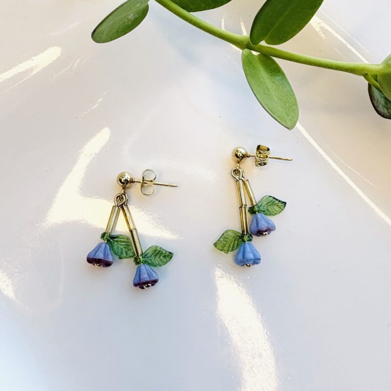 Anka Snider small blue-violet flower earrings